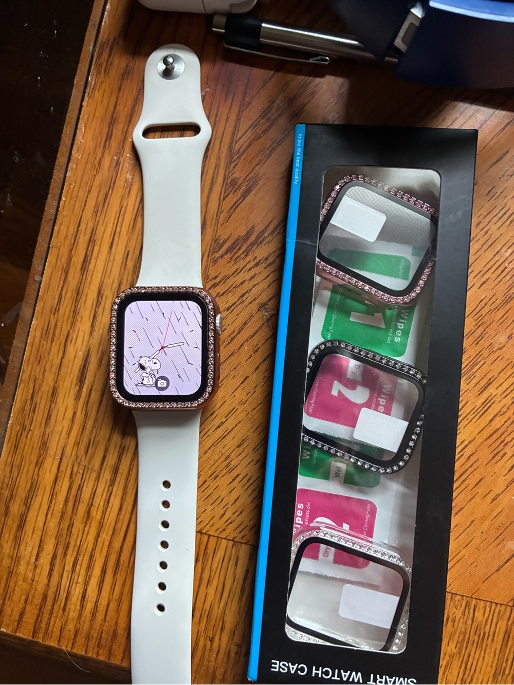 Apple White Smartwatch with Rose Gold Rhinestone Case